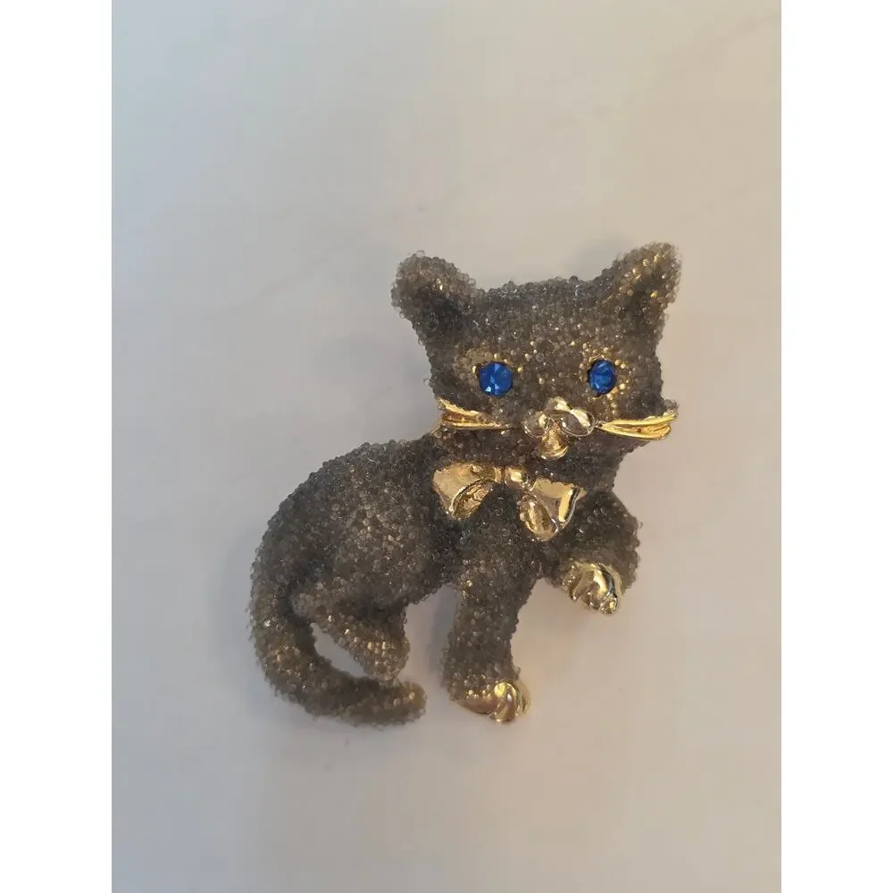 Kitty Cat with Blue Rhinestone Eyes Brooch Gold Tone Encrusted Playful Bow